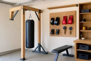 DIY heavy bag stand and organized boxing gear in a home gym